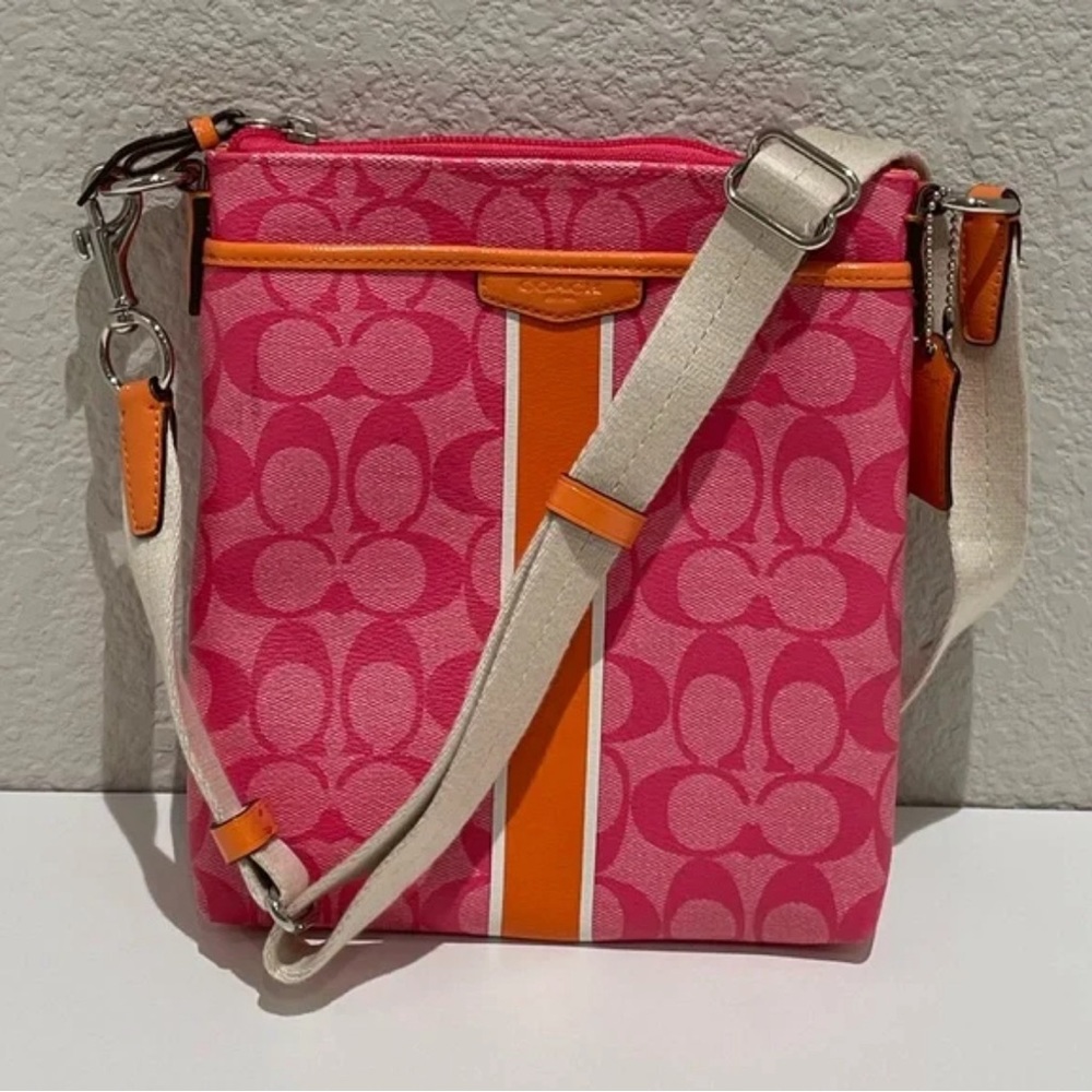 Coach Signature Pink Orange Stripe Swingpack- used but in great condition!